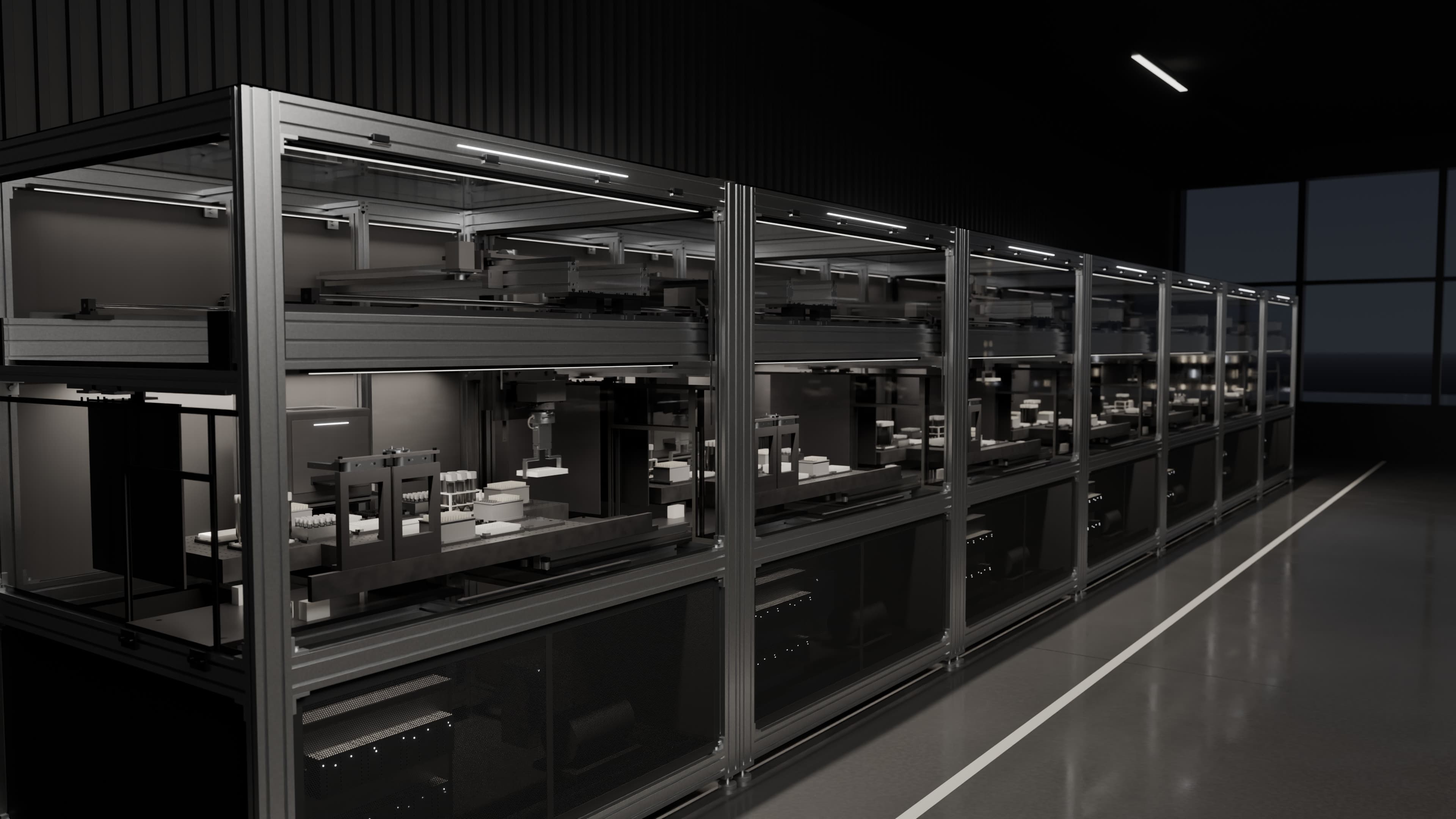 A row of glass-enclosed automated lab machines in a dark laboratory at night, each lit from inside, with a robotic gantry moving a sample plate above trays of plates, pipette tips and tubes.