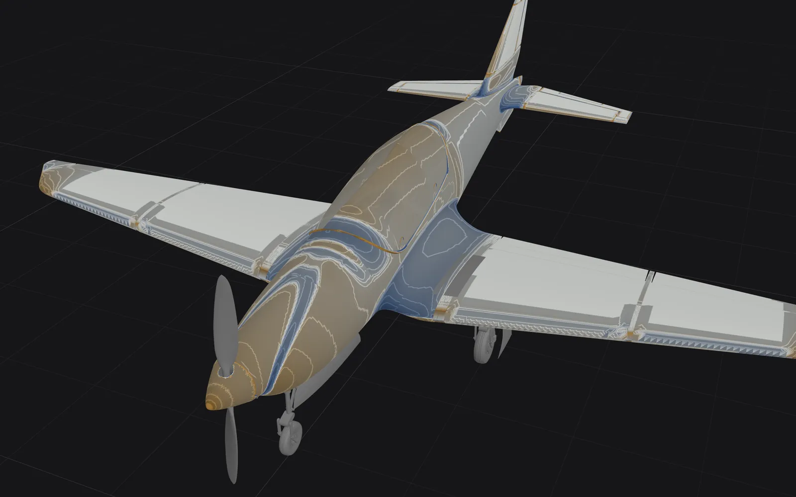 The aircraft shaded by curvature: ochre on the nose and canopy, blue in the saddles at the wing roots, grey on the flat wing panels.