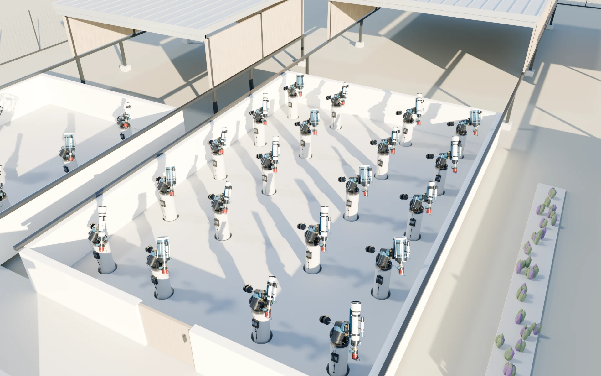 One shared bay seen from above, with twenty compact telescopes on individual concrete piers and the upper enclosure parked to one side.